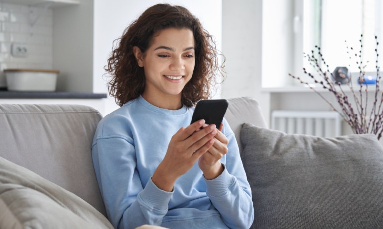 woman using app on phone